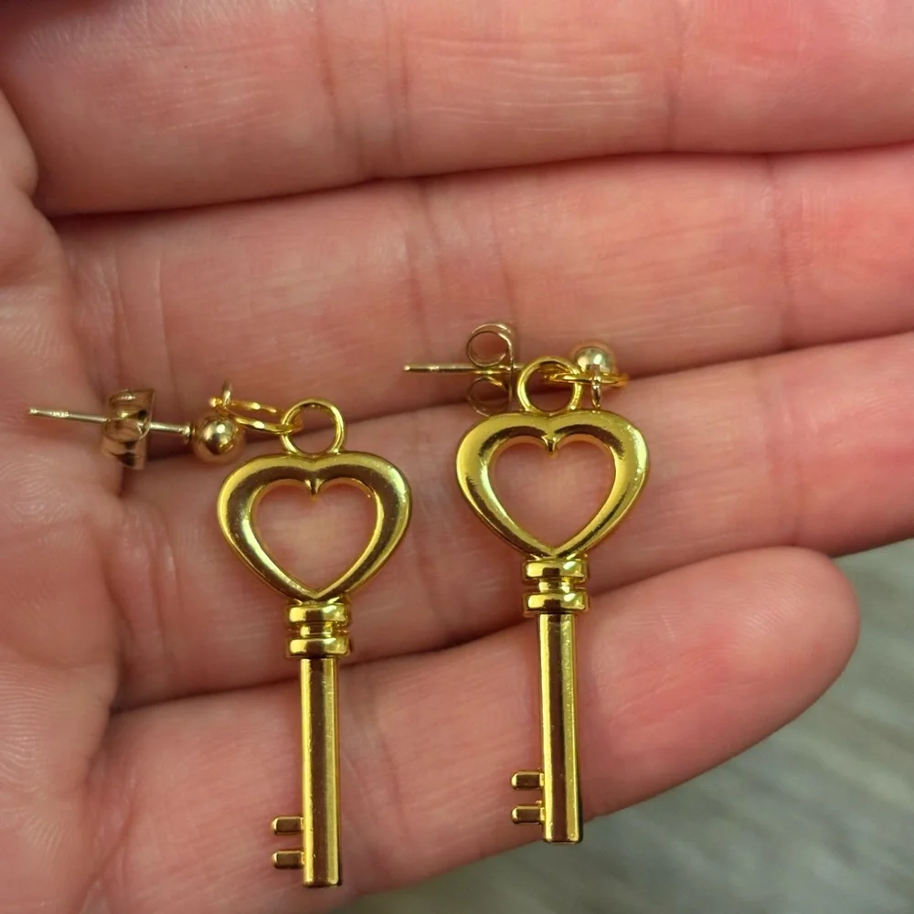Gold lv earrings